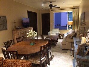 Dining Area and Living Room, with large entry to the 2nd Living Room/Playroom