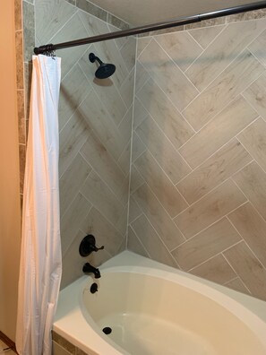 large tub and shower in the master bedroom