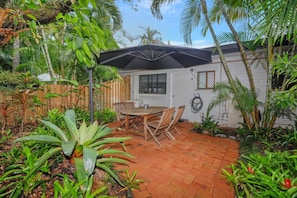 Lovely private fully fenced outside area to enjoy tropical weather