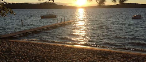 View from front porch over the beach of the dock and moorings