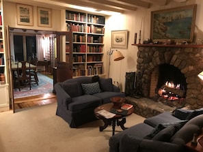 Main Living Room with fireplace, looking into DR