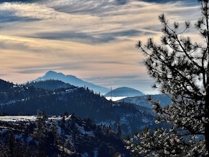 Looking to Mt Shasta from our southern viewpoint, along one of our land's trails
