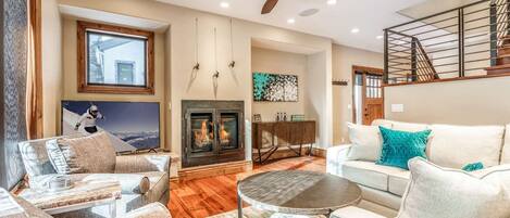 Curl up on the sofa to warm up in front of the gas fireplace and relax with a movie on the flat screen TV.