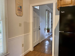 Front Door Leads to Either Kitchen or Living Room 