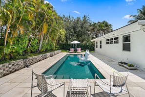 Relax in the private pool. Upgrade for heating. Chill by pool