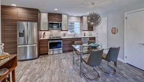 Fully updated kitchen with simple dining area