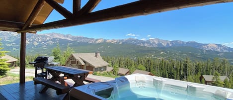 Cowboy Heaven Cabin w/Unbeatable Mountain Views, hot tub, grill, seating.