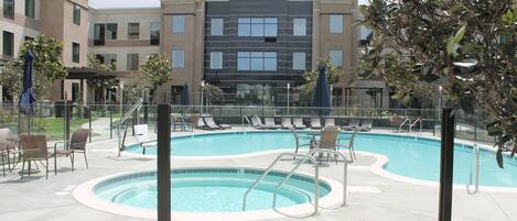 Dive into the outdoor pool on a hot summer day.