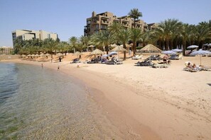 Clean, sandy beach with lots of sunbathing opportunities.