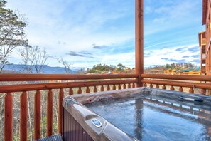 Enjoy the view of the mountain while relaxing in the private hot tub.