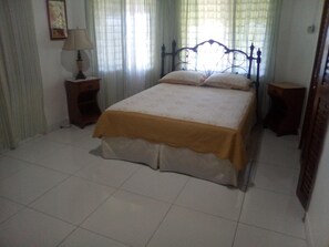 Queen size bed in 1 bedroom