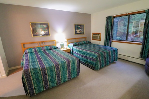 Get a good nights sleep in this bedroom with 2 double beds