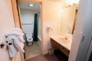 Full size bathroom with a bathtub/shower combination.