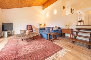 Rozel, St Agnes. Ground floor: Light floods into the sitting room from the floor to ceiling windows