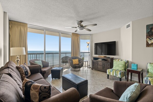 A modernly decorated living room provides comfort and endless ocean views.