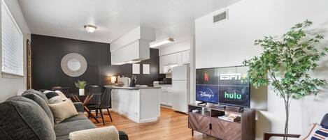 Living room with sleeper sofa, smart tv and plenty of seating