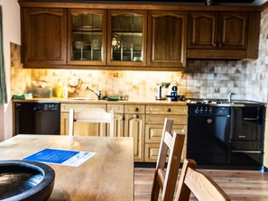Countertop, Cabinetry, Furniture, Property, Kitchen, Blue, Wood, Lighting, Interior Design, Kitchen Appliance