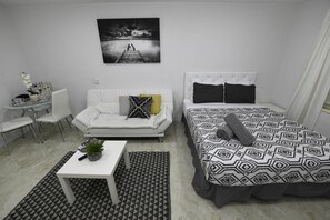 The apartment features 1 Queen size bed and 1 sofa bed.