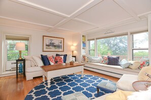 Enjoy the views of Granite Pier from the bright and cheerful living room.