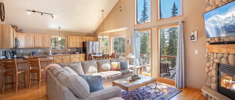 Open floor plan, vaulted ceilings, and large windows to take in the views.    