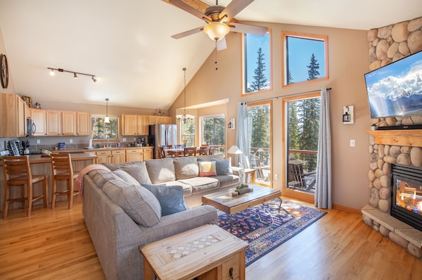 Open floor plan, vaulted ceilings, and large windows to take in the views.    