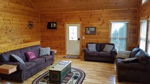 Spacious living area w plenty of light - main level (which is the upper level)