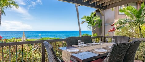 Ocean front dining on spacious covered lanai