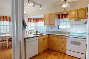 The 2nd floor kitchen is well appointed with a breakfast bar and everything you need to make that big meal.
