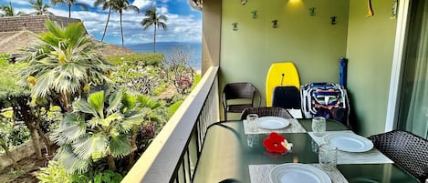 Ocean view peeks from lanai - varies with landscaping heights.