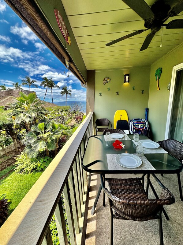 Ocean view peeks from lanai - varies with landscaping heights.