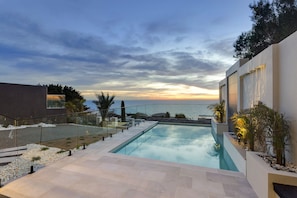 Sunset by the large FULLY gas heated pool - Ocean View from pool