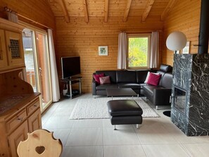 Furniture, Cabinetry, Interior Design, Wood, Flooring, Floor, Living Room, Chair, Hardwood, Real Estate