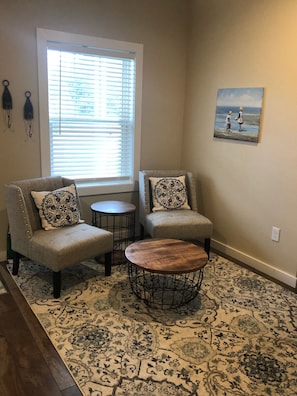 Seating area with TV on first level.