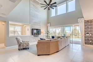 Grand Family Room with 65in TV and retracting doors for an in/out experience!