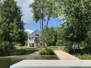Lawn, fire pit, boat launch and dock