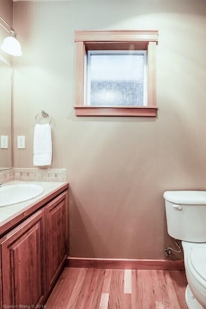 There is a half bathroom near the living area.

(Note: this photo is from this home's real estate listing. This is a new listing for us and we are awaiting a pro photo shoot.)