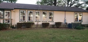 Multiple windows in Living Room for Lake viewing. Large Back Yard.