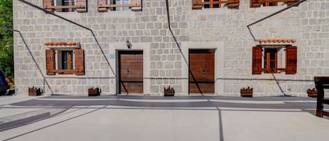 Classical old Monetengrin house style. Wood, stone and authentic window covers 