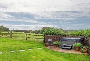 Lawned garden with hot tub