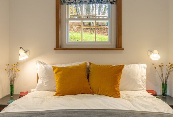 Light and airy bedroom with a cosy feel
