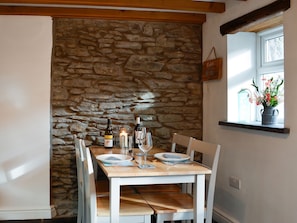 Modest dining area in the kitchen | Noddfa Cottage, Llanfairtalhaiarn, near Abergele