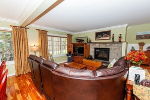 Recharging after a long day at the mountain is easy in this condo`s beautiful living room