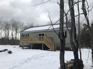 The deck faces the ski mountain.