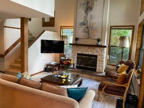 Main Floor - Living Room With Wood Burning Fireplace