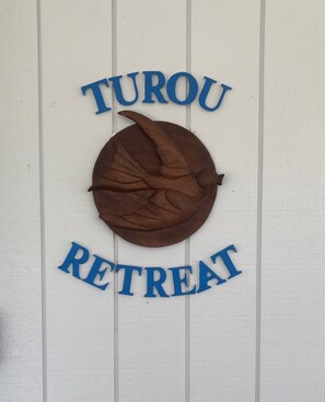 This bird carving has a special meaning to our house. There is a story book.