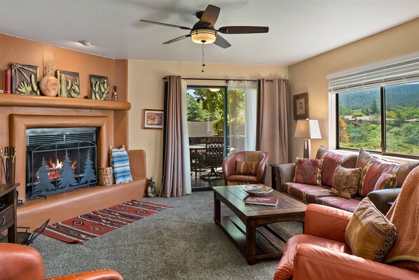 Comfy & Cozy living room with fireplace for the cool desert nights