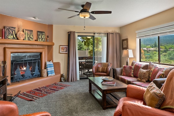 Comfy & Cozy living room with fireplace for the cool desert nights