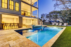 Enjoy an evening poolside or on one of the many decks