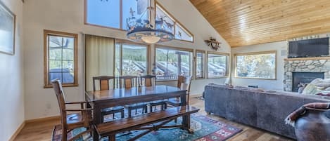 Dining Area - Seating for up to eight guests with 5 chairs and a bench. Dining area also provides access to the private balcony.