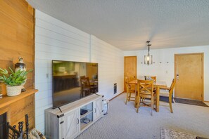 Living Room & Dining Area | Wood-Burning Fireplace | Natural Sunlight
